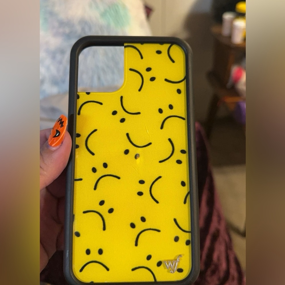 Sad smiles iPhone 11 wildflower case